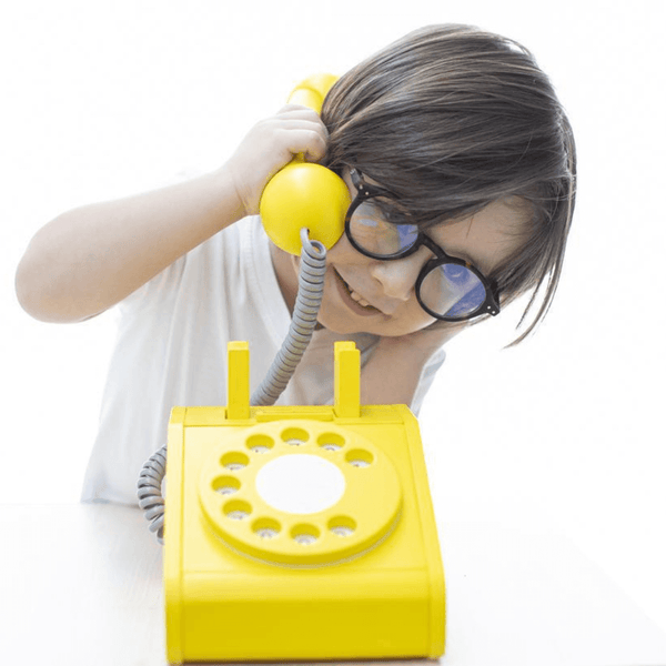 GG Yellow phone is made of minimalist design wooden toy
