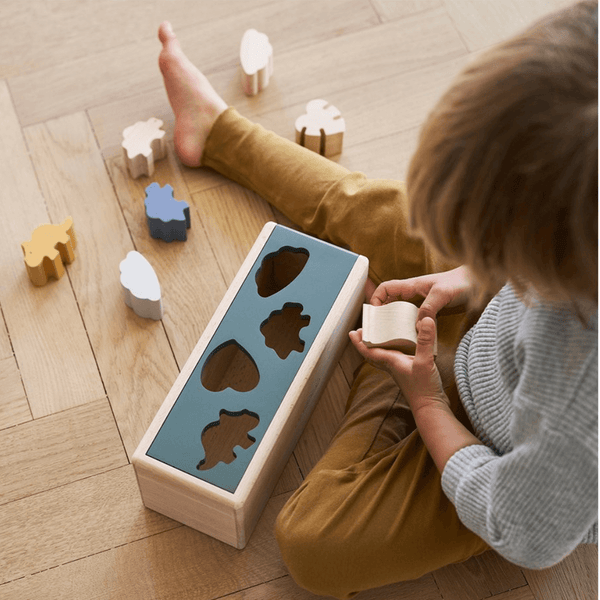 Liewood Midas Puzzle Box Dino comes with 8 wooden blocks